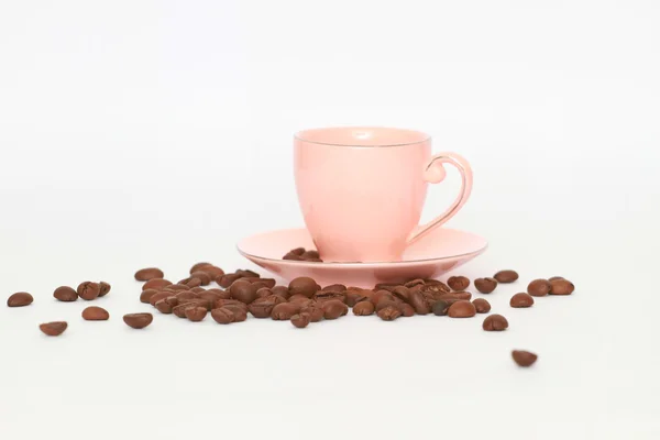 Csésze kávé és a gabona, a fehér háttér — Stock Fotó