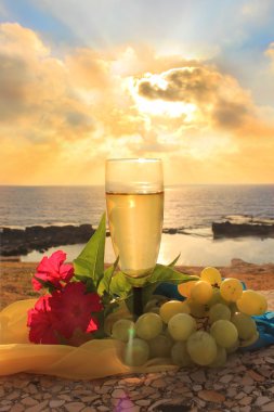 Scenery with glass of white wine clipart