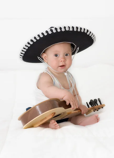 Niño con una guitarra — Foto de Stock