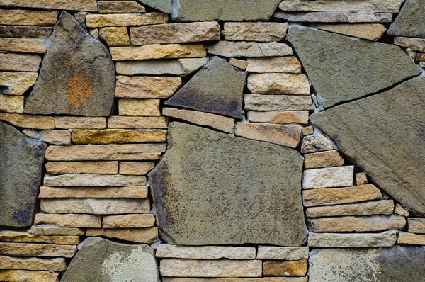 Mosaico muro di pietra — Foto Stock