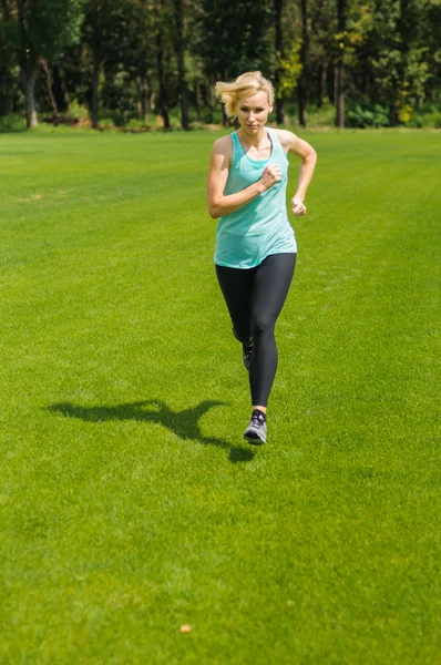 stock image Portrait of a young woman jogging