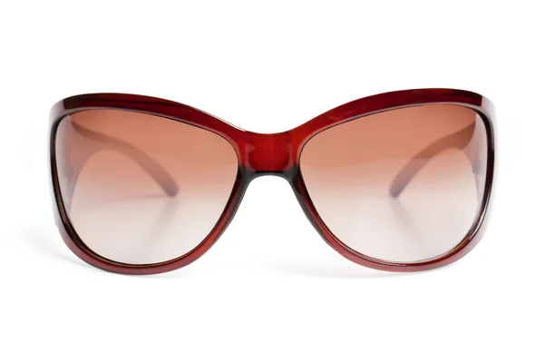 Solglasögon i bruna kanten — Stockfoto