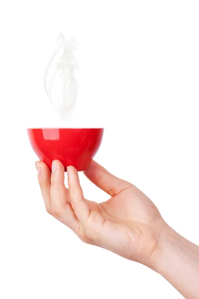 Κόκκινο ζεστό φλιτζάνι καφέ στο χέρι — Φωτογραφία Αρχείου