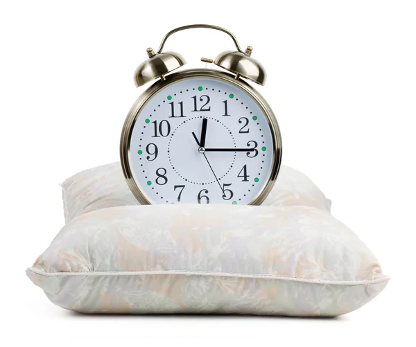 Metal alarm clock on a pillow — Stock Photo, Image