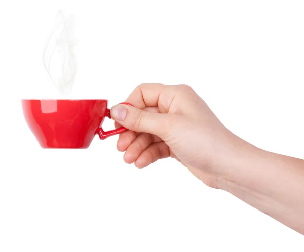Xícara vermelha de chá ou café na mão — Fotografia de Stock