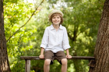 Gay boy in a hat and shirt clipart