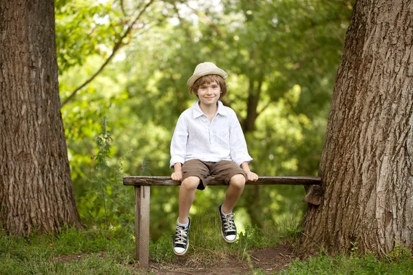 Little boy in a hat, shorts — Stock Photo, Image