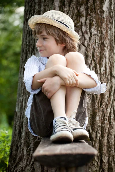 Fair-haired boy in sneakers — Stock Photo, Image