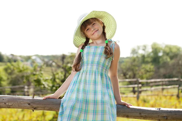 Menina engraçada em um vestido bonito — Fotografia de Stock