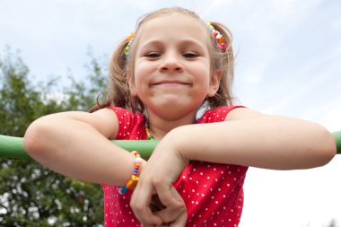 Smiling girl with pigtails clipart