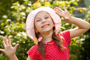 Little girl in a red shirt clipart