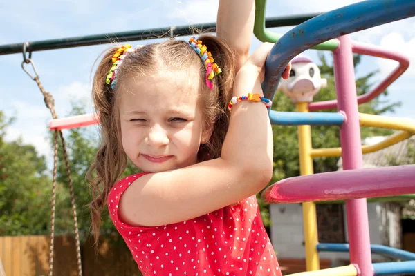Girl playing on the playground — Stock Photo, Image