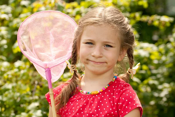 Little girl with a net — Stock Photo, Image