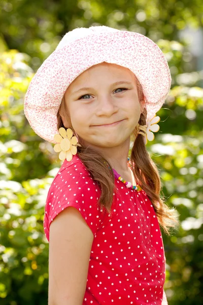 Smiling girl with pigtails — Stock Photo, Image