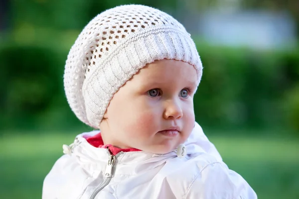 Charming babe in a white jacket — Stock Photo, Image