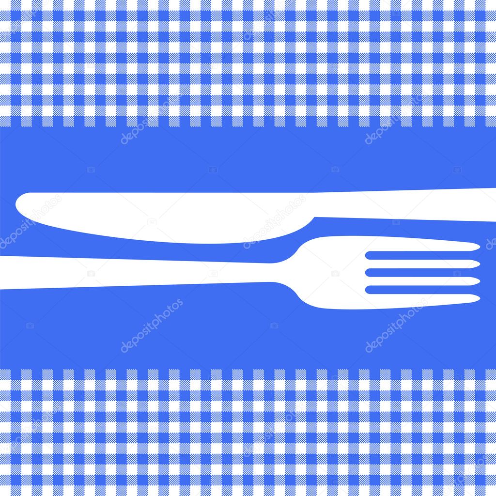 Cutlery on blue tablecloth