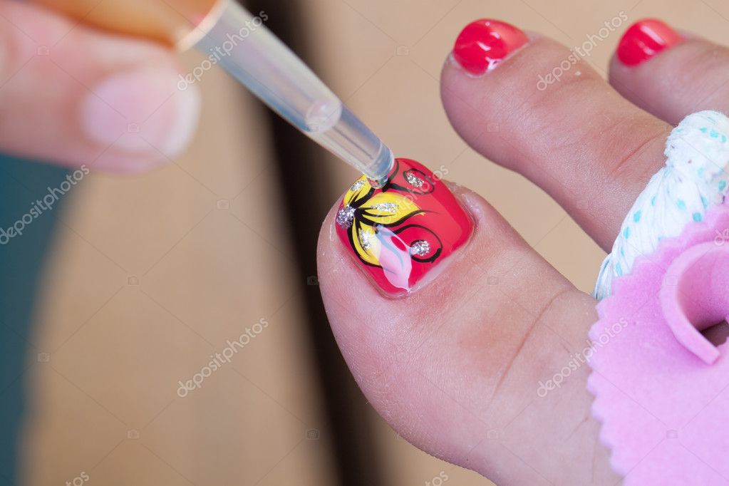 Pedicure procedure Stock Photo by ©alexhg1 11441297
