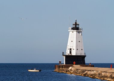 Ludington Light and Fishermen clipart