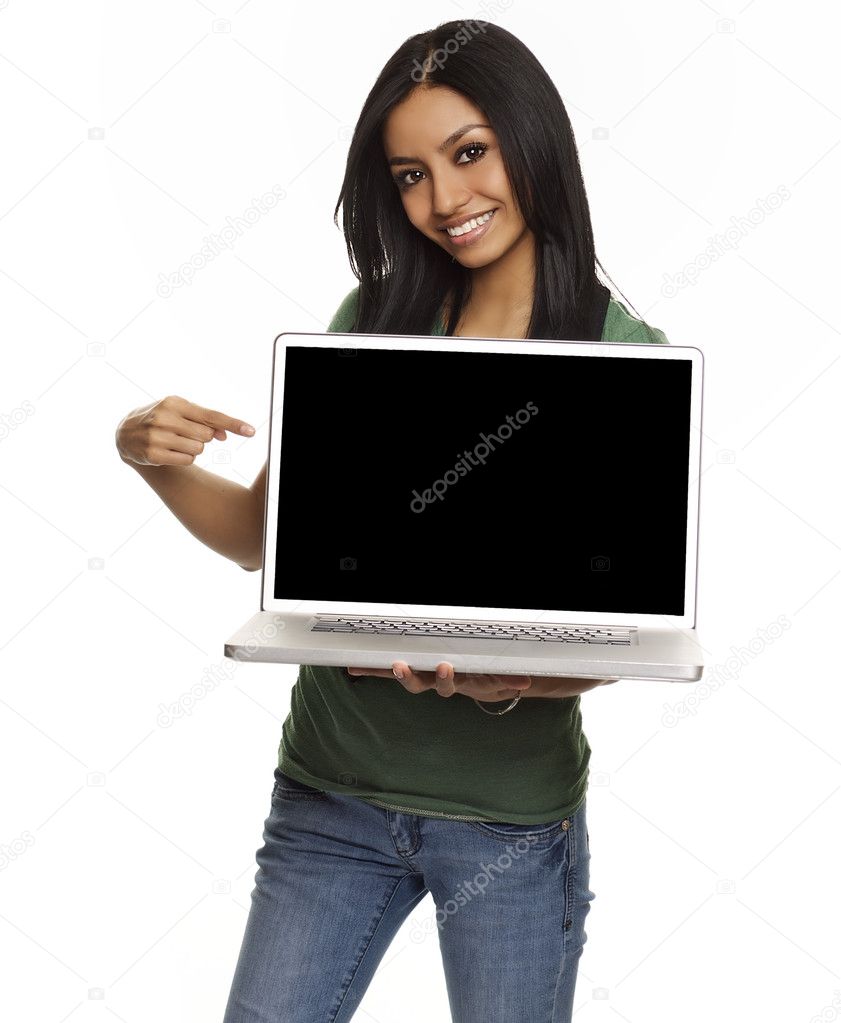 Pretty young woman holding laptop computer