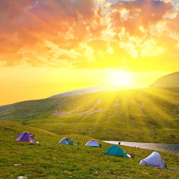stock image Touristic camp in a mountains at the morning