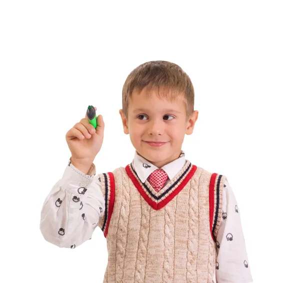 Чарівний хлопчик тримає ручку, ізольований на білому тлі — стокове фото