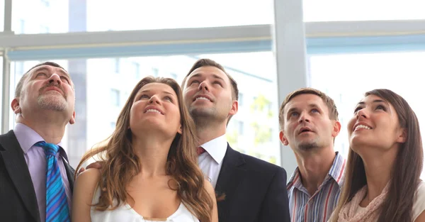Group of executives looking up — Stock Photo, Image