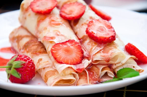 Delicious flavored pancakes for breakfast — Stock Photo, Image