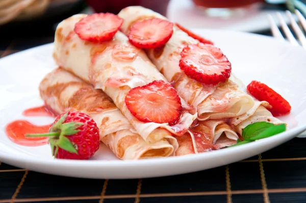 Delicious flavored pancakes for breakfast — Stock Photo, Image