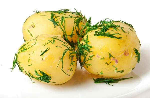 Jonge gekookte aardappelen met dille in olie — Stockfoto