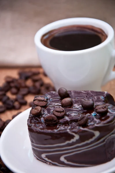 Šálek kávy a čokoládový dort — Stock fotografie