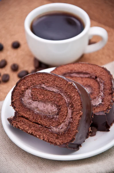 Xícara de café e bolo de chocolate — Fotografia de Stock