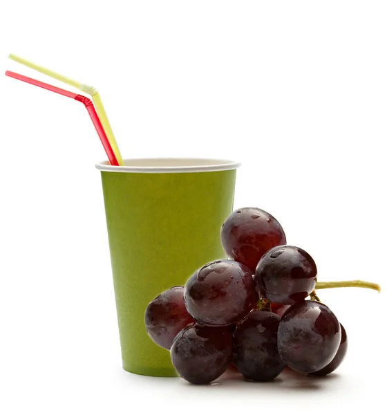 Paper cup with straws and grapes — Stock Photo, Image