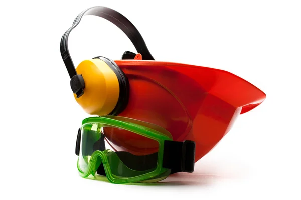 Röd skyddshjälm med hörlurar och glasögon — Stockfoto