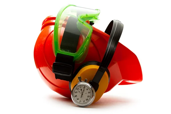 Capacete de segurança vermelho com fones de ouvido — Fotografia de Stock