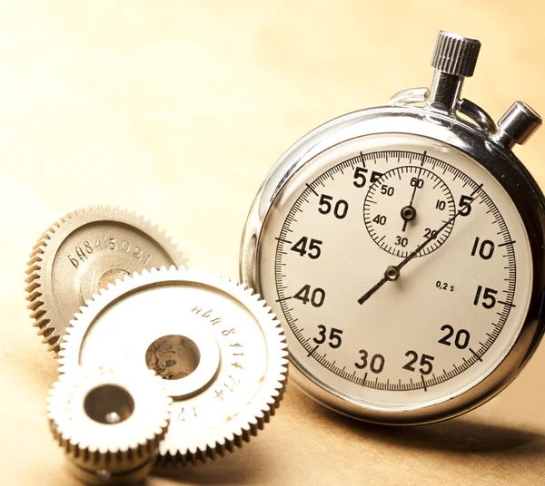 Mechanical ratchets and stopwatch — Stock Photo, Image