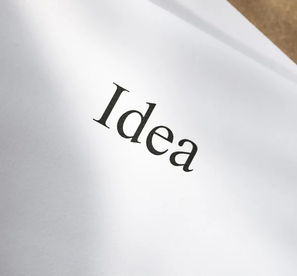 Idea conception on blank paper — Stock Photo, Image