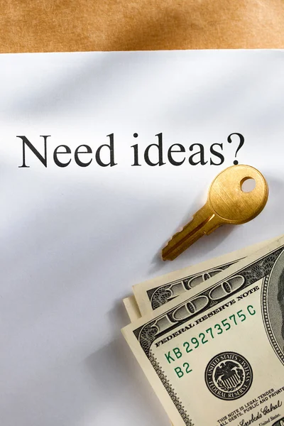 Idea conception with key and money — Stock Photo, Image