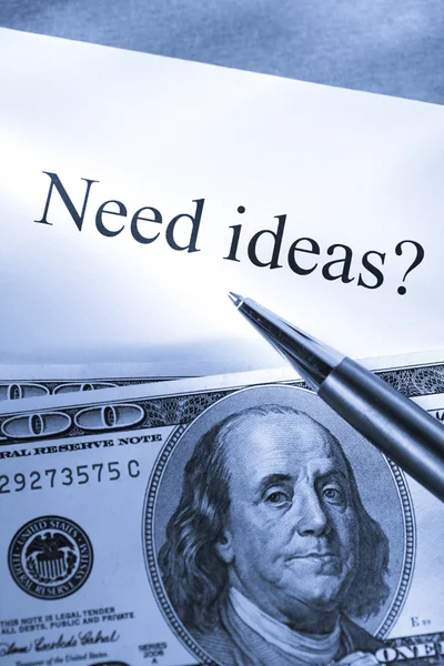 Idea conception with pen and money — Stock Photo, Image
