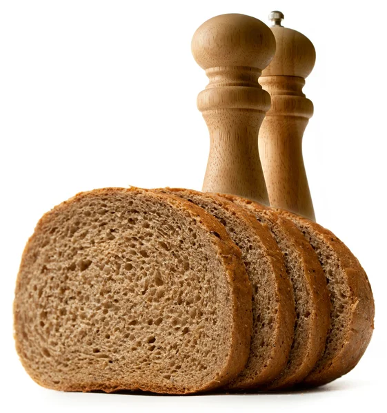 Kromki chleba z solą i pieprzem — Zdjęcie stockowe