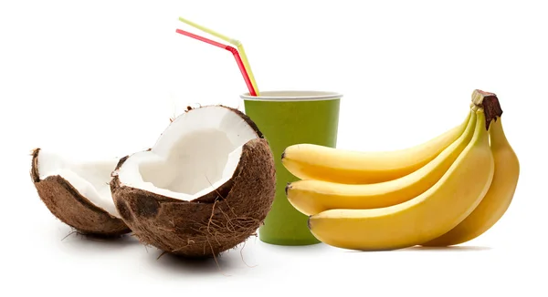 Paper cup, bananas and coconut — Stock Photo, Image