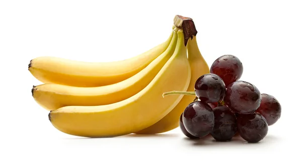 Bunch of ripe bananas and grapes — Stock Photo, Image