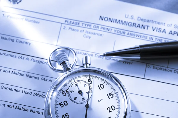 stock image Application form with stopwatch and pen