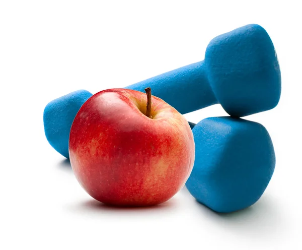 stock image Blue dumbbells and red apple