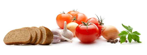 Gemüse mit Brot auf Weiß — Stockfoto