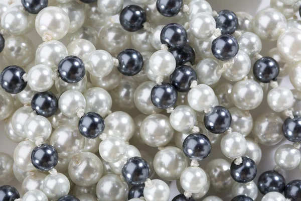 String of black and white pearls — Stock Photo, Image