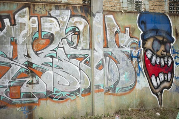 Arte de graffiti na parede de rua — Fotografia de Stock