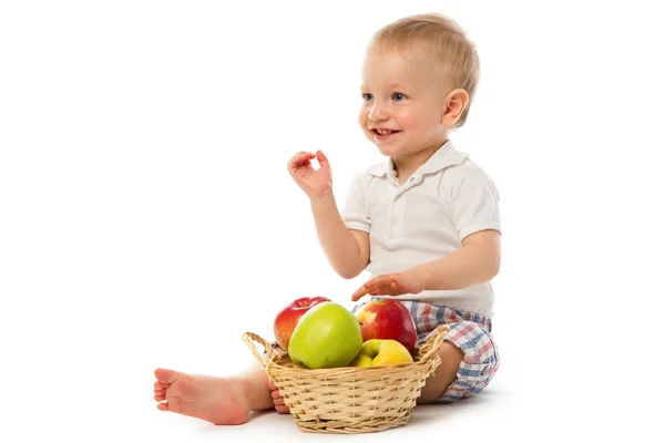 stock image Child with basket of apples