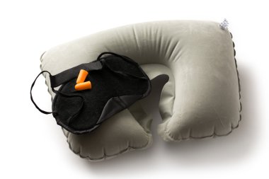 Sleeping mask, cushion and earplugs clipart