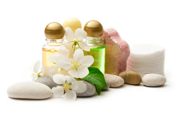 Apple tree flowers, stones and shampoo — Stock Photo, Image