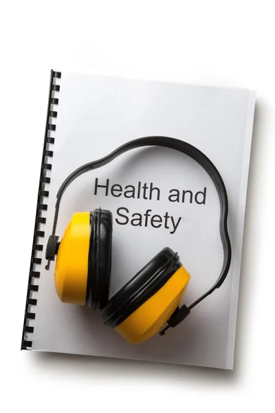 Hälsa och säkerhet registrera med hörlurar — Stockfoto